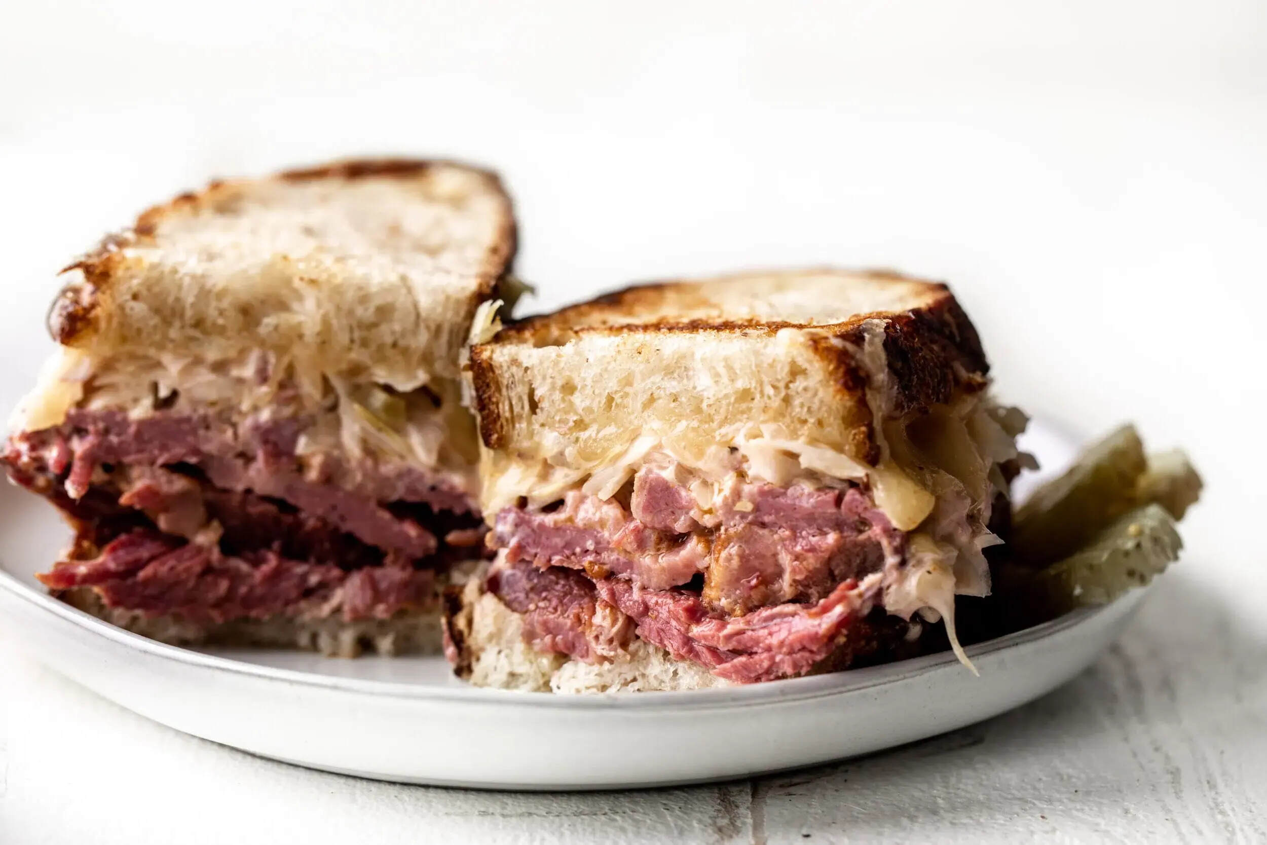 slow-cooker-corned-beef-reuben-sandwiches-recipe
